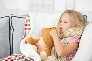 Young-girl-in-bed-with-a-whooping-cough
