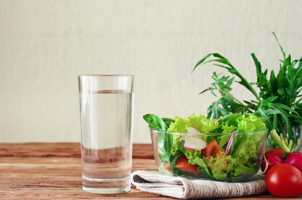 glass-of-water-and-salad-bowl